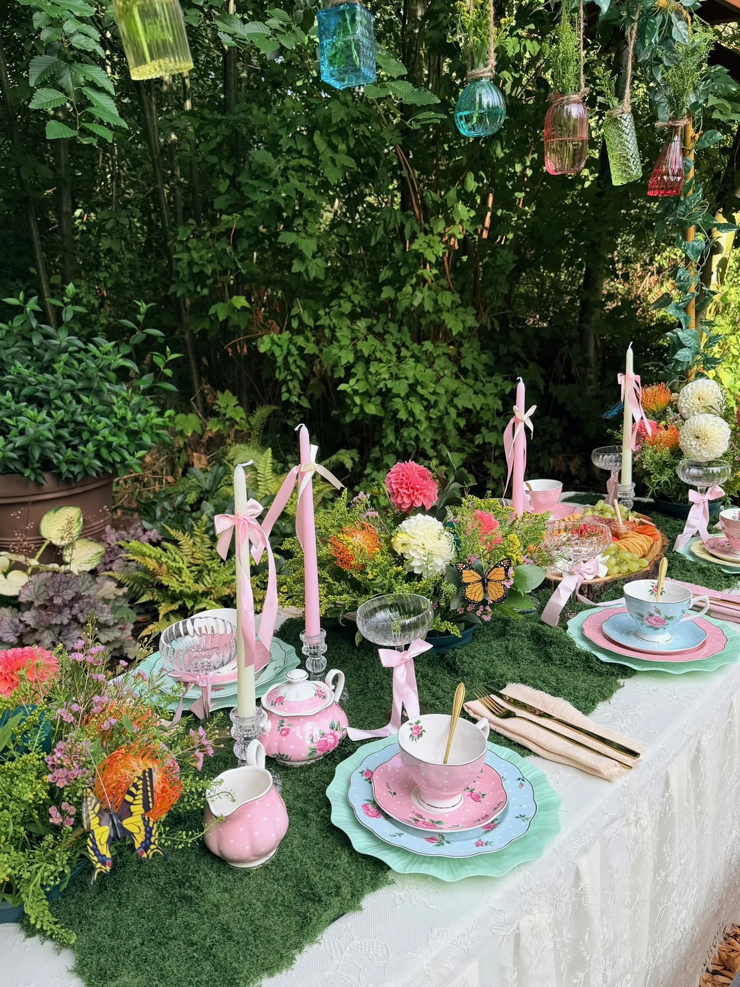 Pastel tea service with flowers, butterflies and pink ribbon details